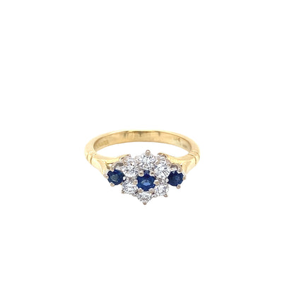 Round Sapphire and Round Brilliant Cut Diamond Cluster Style Ring