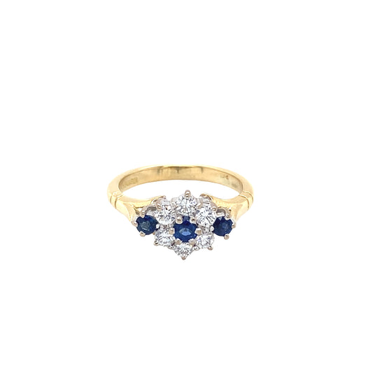 Round Sapphire and Round Brilliant Cut Diamond Cluster Style Ring