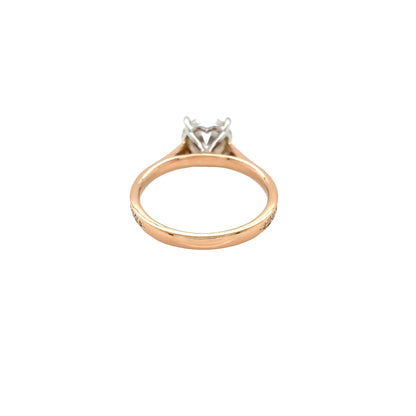 Round Brilliant Cut Diamond Solitaire with Diamond set shoulders