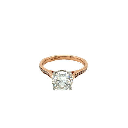 Round Brilliant Cut Diamond Solitaire with Diamond set shoulders