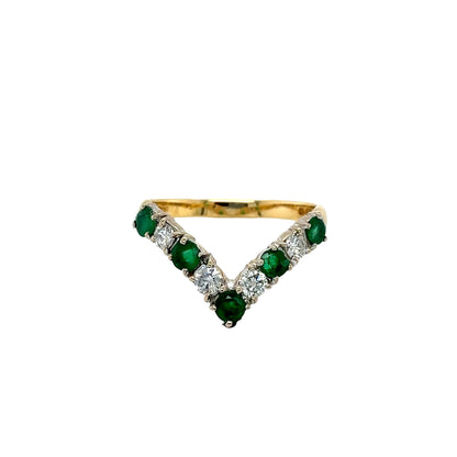 Emerald and Round Brilliant Cut Diamond
