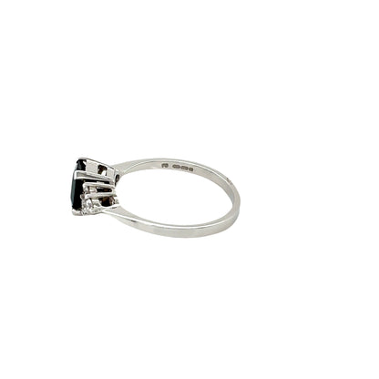 Sapphire and 6 Round Brilliant Cut Diamond Ring