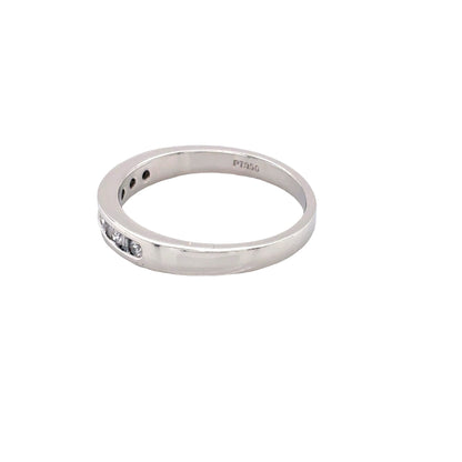 Round Brilliant Cut and Baguette Cut Diamond Channel Set Ring