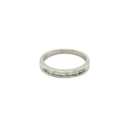 Round Brilliant Cut and Baguette Cut Diamond Channel Set Ring