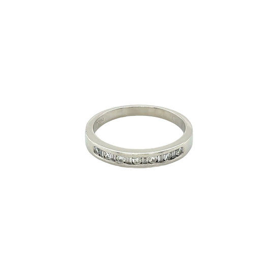 Round Brilliant Cut and Baguette Cut Diamond Channel Set Ring