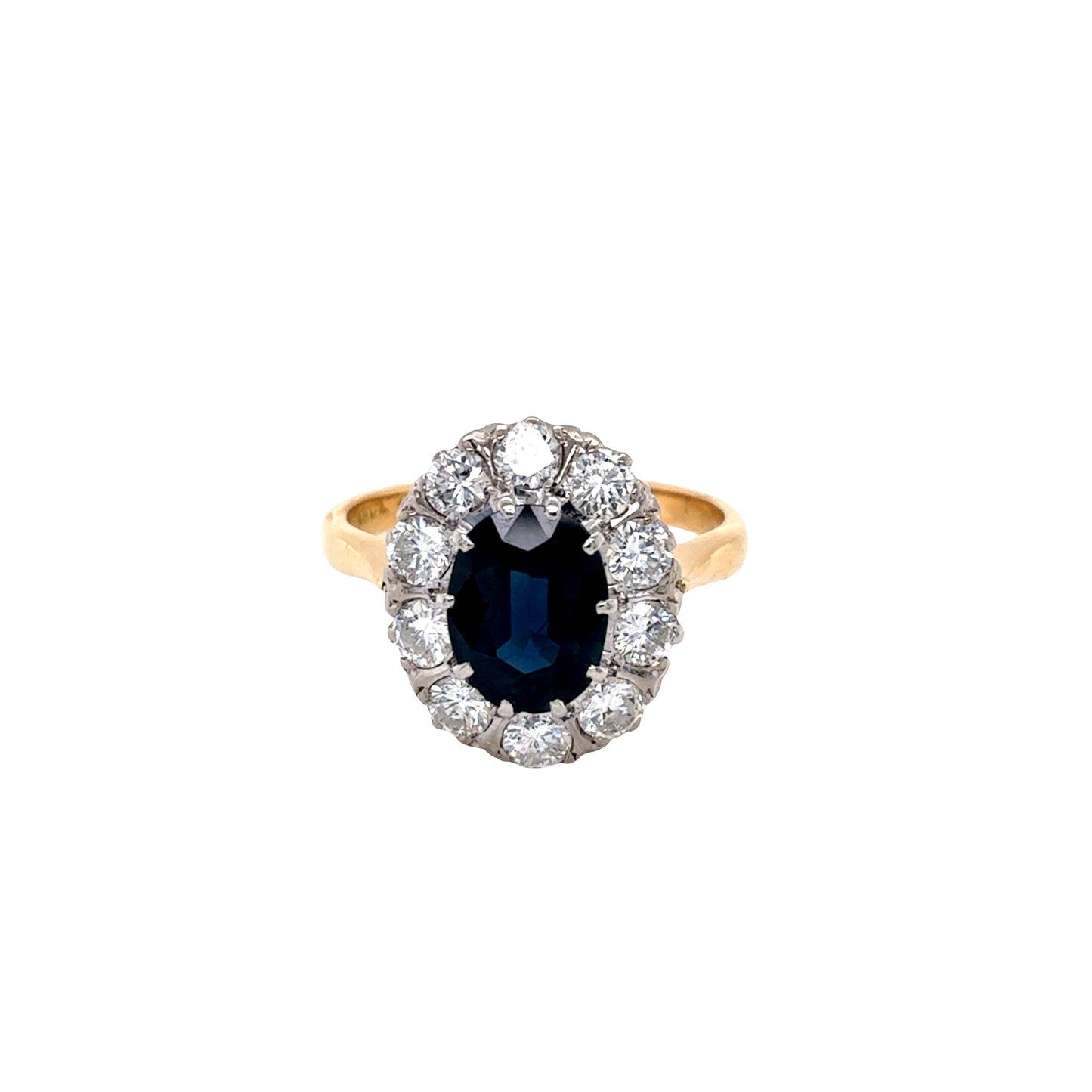 Oval Sapphire and Round Brilliant Cut Diamond Cluster Style Ring