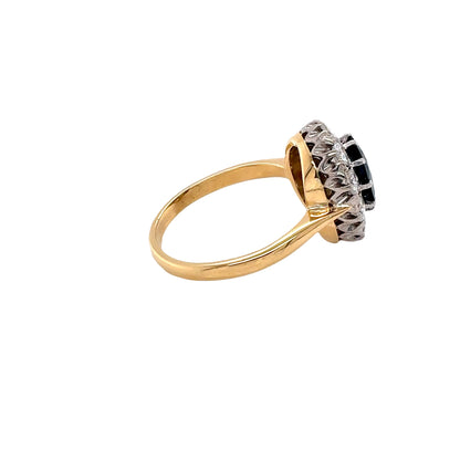 Oval Sapphire and Round Brilliant Cut Diamond Cluster Style Ring