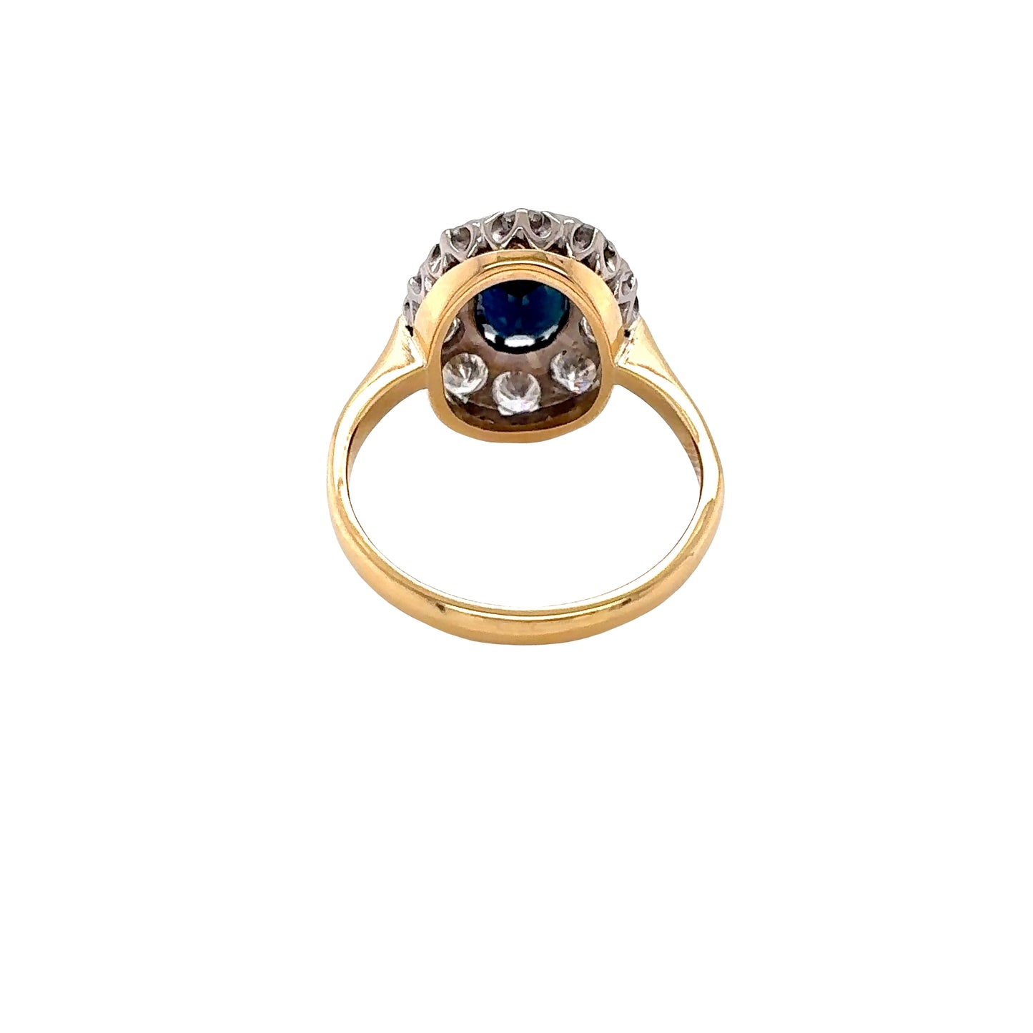 Oval Sapphire and Round Brilliant Cut Diamond Cluster Style Ring