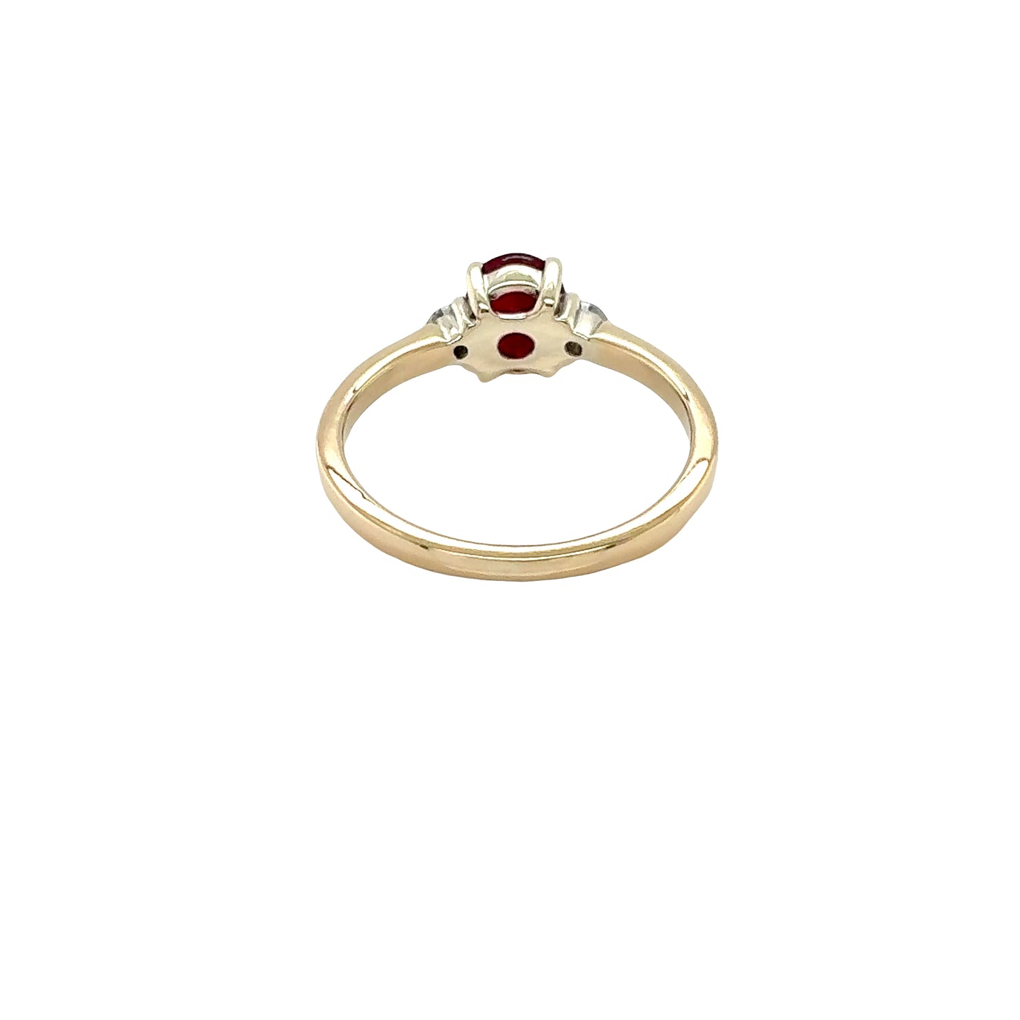 Oval shaped Ruby and Round Diamonds 3 Stone Ring