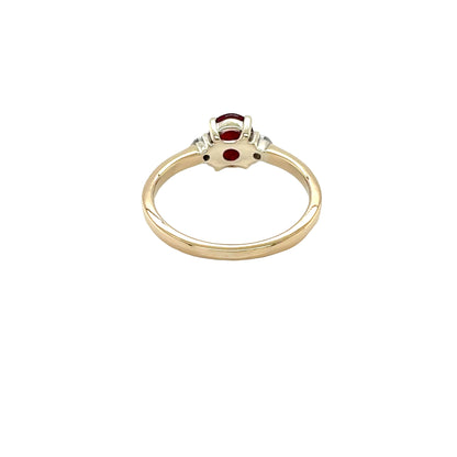 Oval shaped Ruby and Round Diamonds 3 Stone Ring