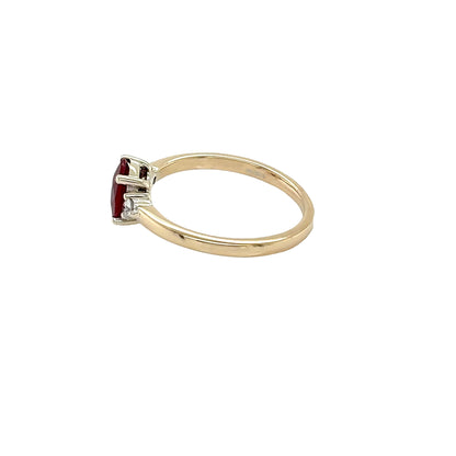 Oval shaped Ruby and Round Diamonds 3 Stone Ring