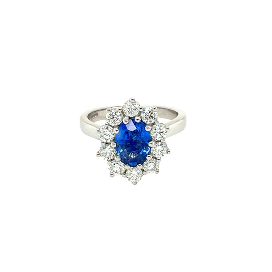 Platinum, Oval Shaped Sapphire with Round Brilliant Cut Diamonds