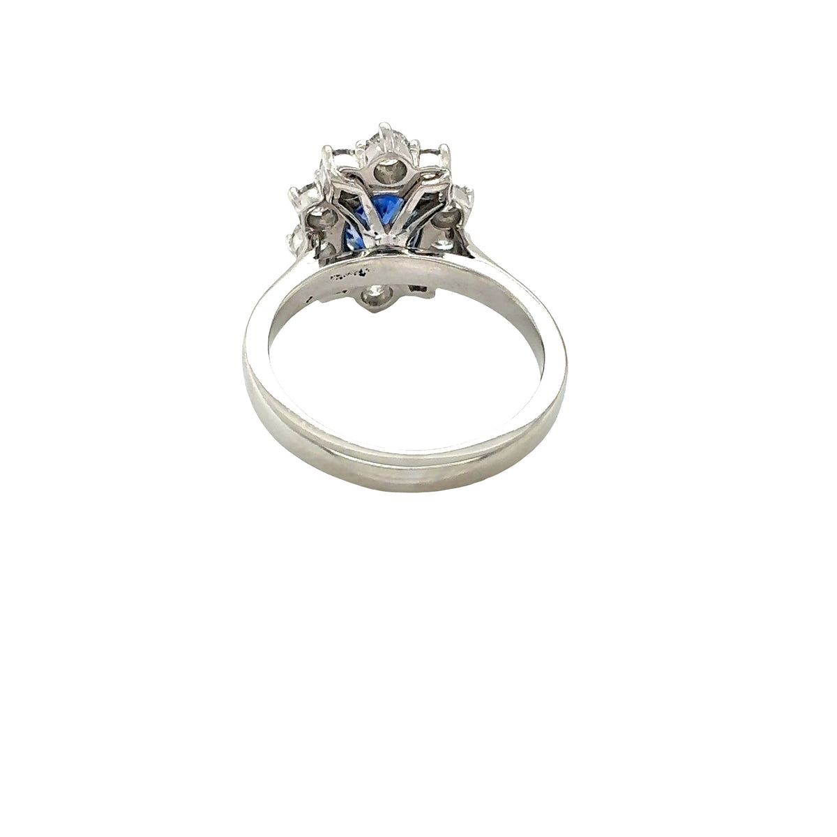 Platinum, Oval Shaped Sapphire with Round Brilliant Cut Diamonds