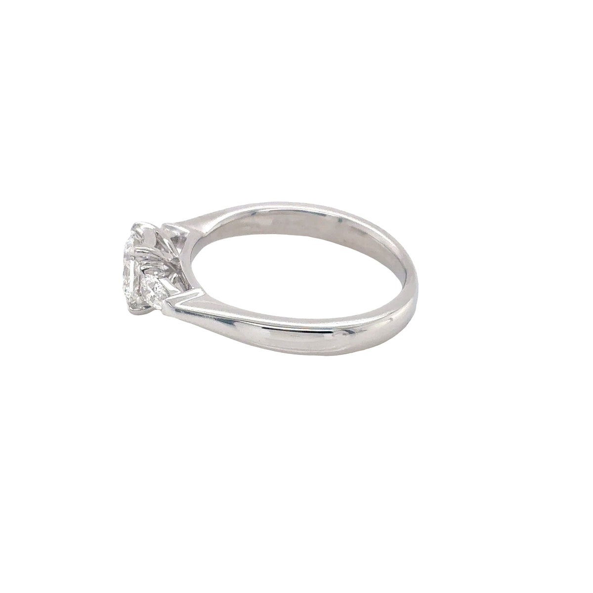 Platinum, Radiant and Pear Cut Diamond 3 Stone Ring