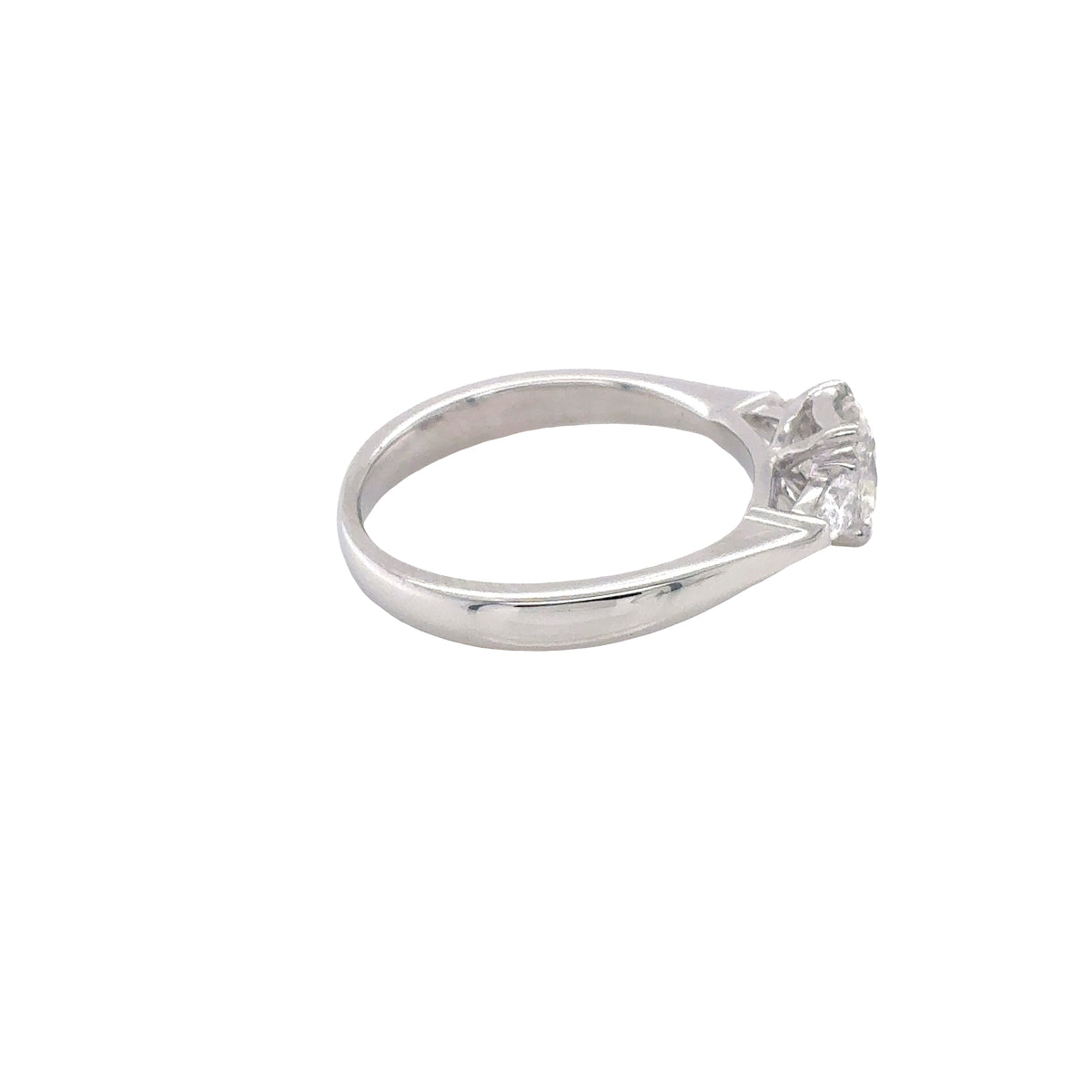 Platinum, Radiant and Pear Cut Diamond 3 Stone Ring