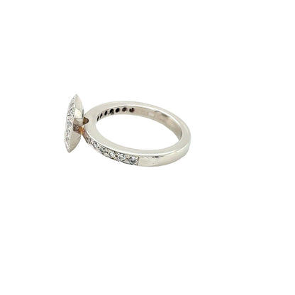 Platinum, Emerald Cut Diamond with Vintage Style Halo and Diamond set Shoulders