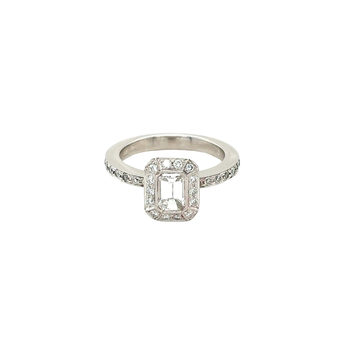 Platinum, Emerald Cut Diamond with Vintage Style Halo and Diamond set Shoulders