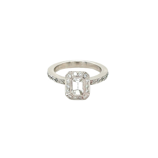 Platinum, Emerald Cut Diamond with Vintage Style Halo and Diamond set Shoulders