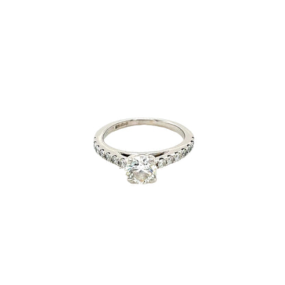 Platinum, Round Brilliant Cut Diamond Solitaire with Diamond set shoulders