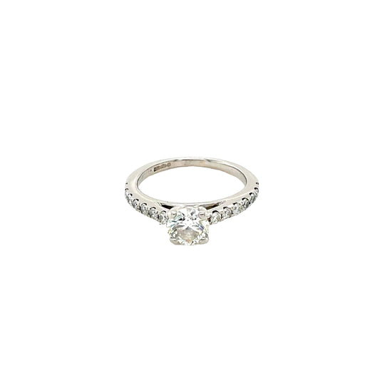 Platinum, Round Brilliant Cut Diamond Solitaire with Diamond set shoulders