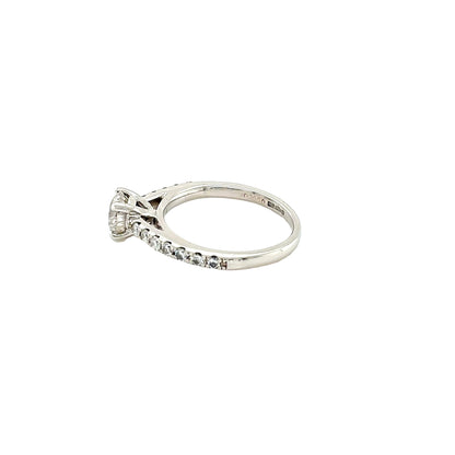 Platinum, Round Brilliant Cut Diamond Solitaire with Diamond set shoulders