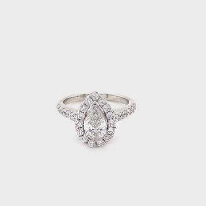 Pear Cut Diamond with halo and Diamond set shoulders