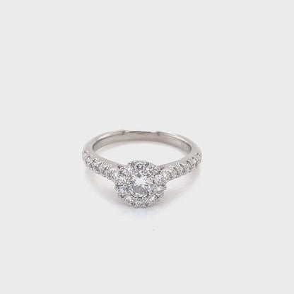 Round Brilliant Cut Diamond Halo Ring with Diamond set shoulders