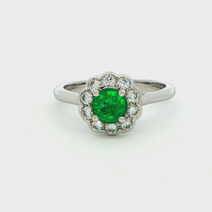 Round Emerald and Round Brilliant Cut Diamond Cluster Ring