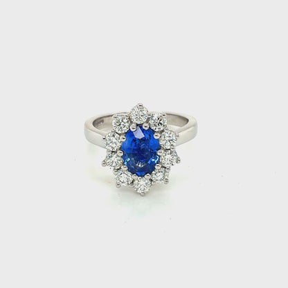 Platinum, Oval Shaped Sapphire with Round Brilliant Cut Diamonds