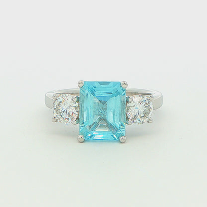 Octagonal Aquamarine and Round Brilliant Cut Diamond 3 Stone Ring
