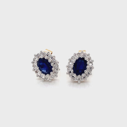 Oval Sapphire and Round Brilliant Cut Diamond Cluster Earrings