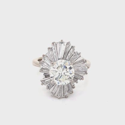 Round Brilliant Cut and Baguette Cut Diamond Ring