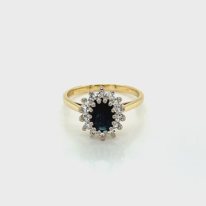 Oval shaped Sapphire and Diamond Cluster Ring