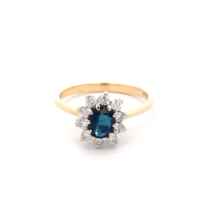 Sapphire and Round Brilliant Cut Diamond Cluster Ring