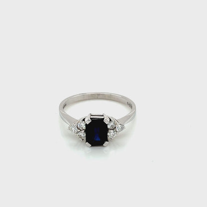 Sapphire and 6 Round Brilliant Cut Diamond Ring