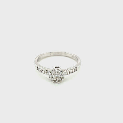 Round Brilliant Cut Diamond Cluster Ring with Diamond set shoulders