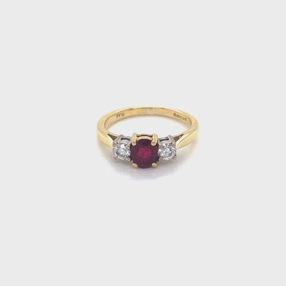 Oval Ruby and Round Brilliant Cut Diamond 3 Stone Ring