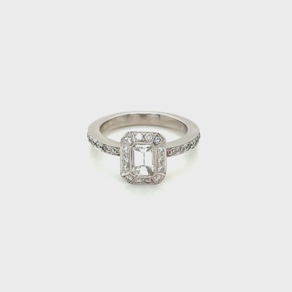 Platinum, Emerald Cut Diamond with Vintage Style Halo and Diamond set Shoulders