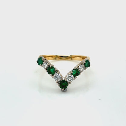 Emerald and Round Brilliant Cut Diamond