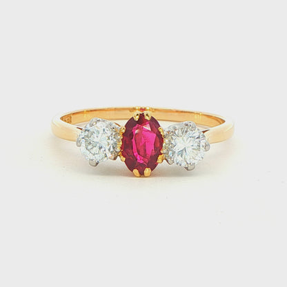 Oval Ruby and Round Brilliant Cut Diamond 3 Stone Ring