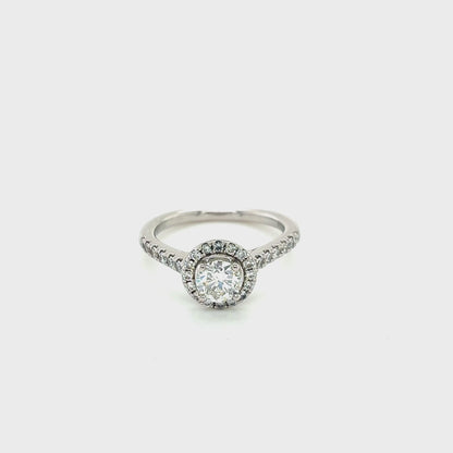 Round Brilliant Cut Diamond Halo Ring with Diamond set shoulders