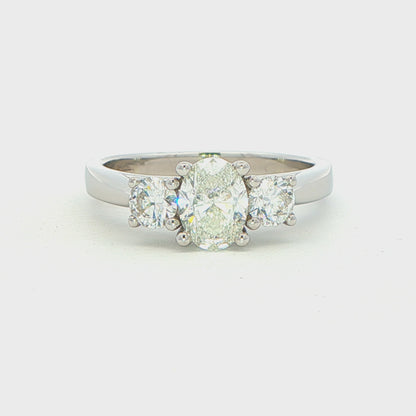 Oval and Round Brilliant Cut Diamond 3 Stone Ring